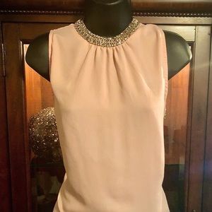 Blouse with beautiful jewels around neck